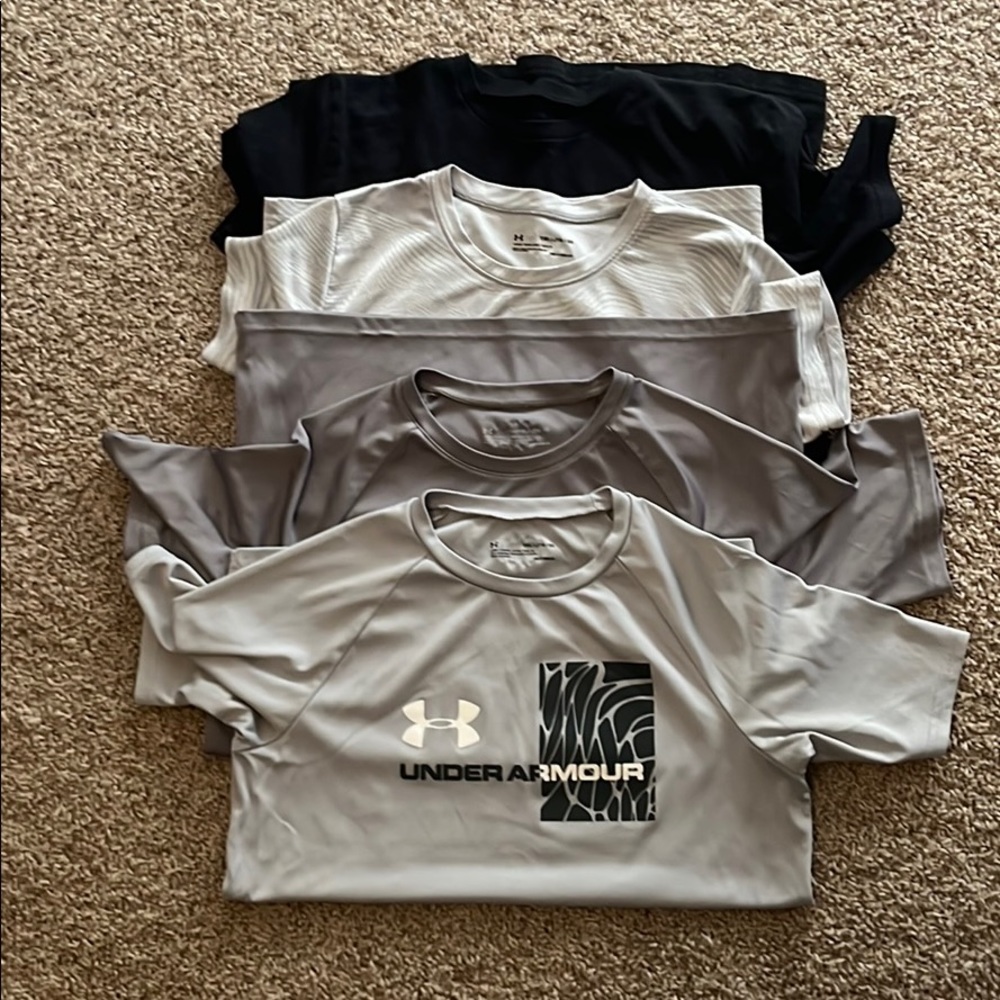 Four under armour shirts